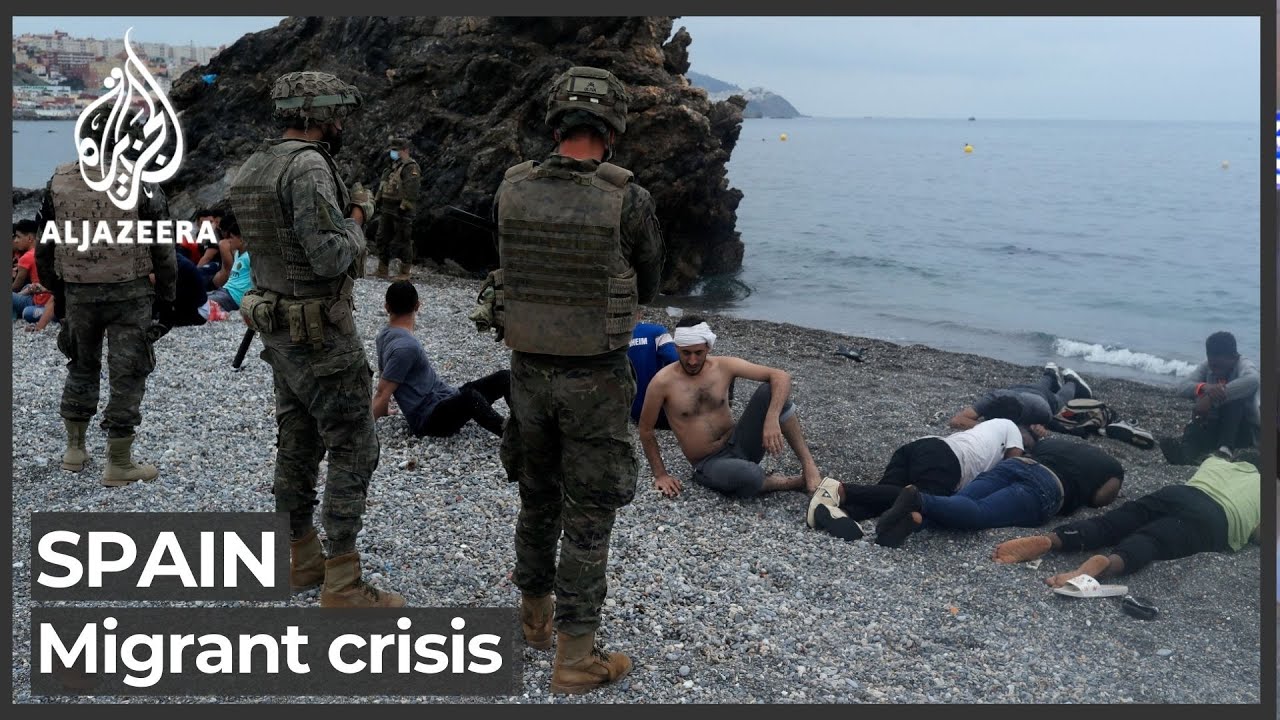 Spain returns people who swam from Morocco, adds troops to border