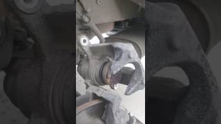 How to push in Ford brake piston