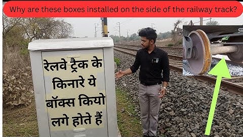 Why are these boxes installed on the side of the railway track?