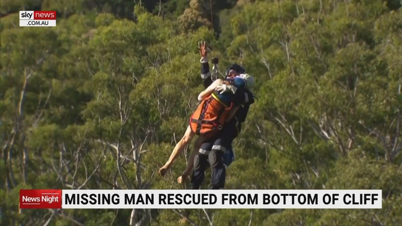 Missing Qld man rescued from cliff fall