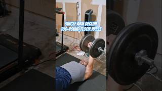 Single arm decline 100-pound floor press