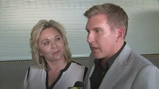 Reality TV stars Todd and Julie Chrisley report to federal prison