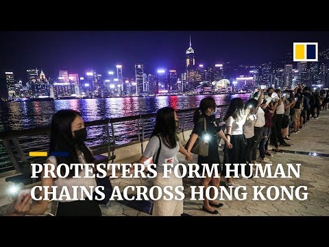 Protesters form human chains across Hong Kong