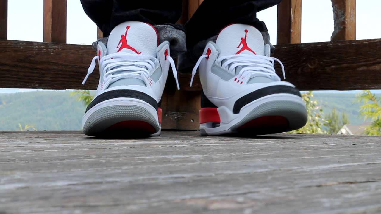 fire red denim 3s on feet