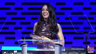 Cassandra Sotos Accepts the NAMM Award for Female Entrepreneur of the Year at the She Rocks Awards