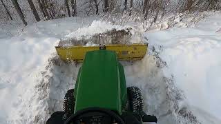 Clearing my whole driveway in 18 minutes flat with a 1992 John Deere 322