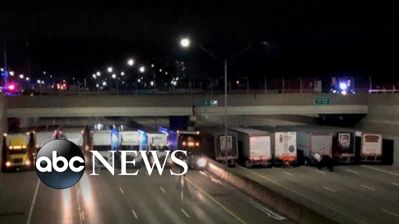 ⁣Trucks line up to help stop suicide attempt on Michigan freeway