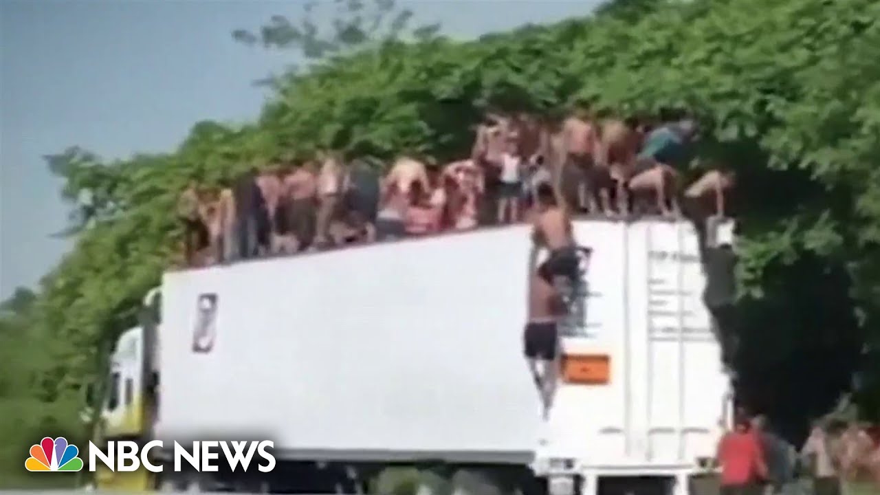 Hundreds of migrants rescued in Mexico after being abandoned in trucks