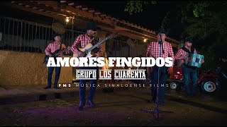 Grupo Los Cuarenta - Amores Fingidos