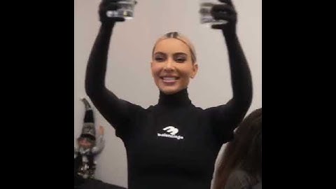 Thumbnail of Kim and Kourtney Kardashian drink alcoholic beverages before recording a Christmas song