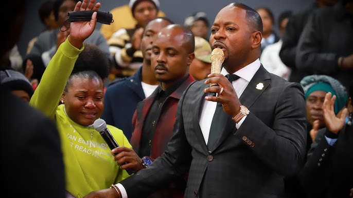 A Woman From Mozambique has a snake moving in her body. - YouTube