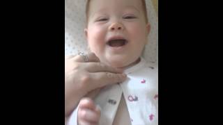 Baby  laughing  at buttons