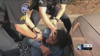 Cellphone video shows police officer punching man in face during takedown