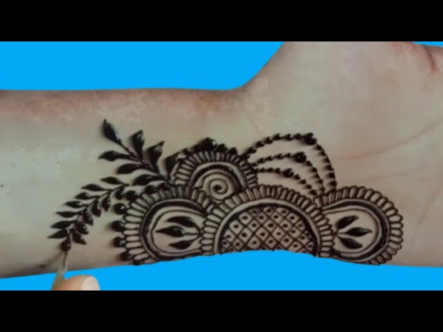 Attractive and easy Arabic henna design/ front hand henna design by roohi mehndi creations.. class=