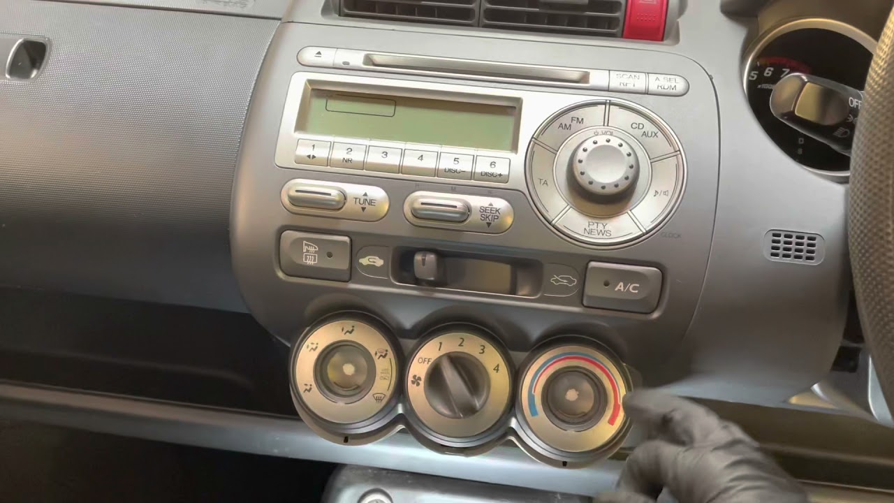 Honda Jazz 2005 radio dash removal - YouTube