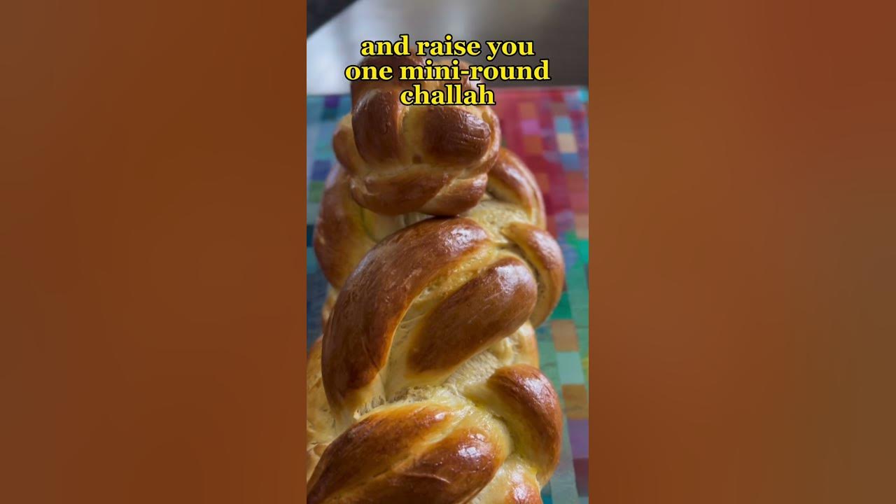 Shabbat shalom. One traditional challah hanging w their lil mini round challah.
