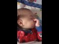 Twin baby loves sucking his thumb - in sleep !