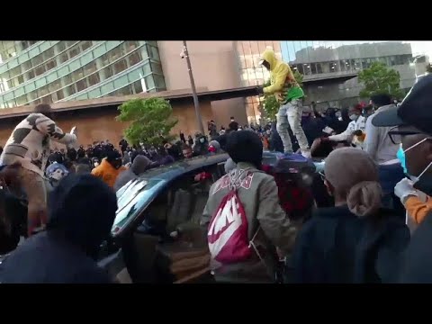 Eyewitness: Women drove car through protesters before being assaulted 