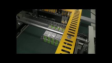 the application of L type shrink packing machine for toothpaste with baffle plate