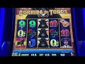 Playing slot machines at the casino