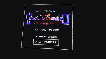 NES top loader with composite and expansion audio mod running Castlevania 3