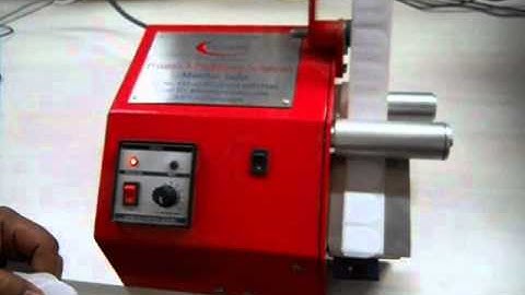 Hand Held Label Dispenser Machine.wmv