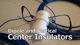 Dipole and Vertical Center Insulators