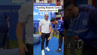Teaching Roberto Carlos How To Shoot playstation xntonio robertocarlos football shorts