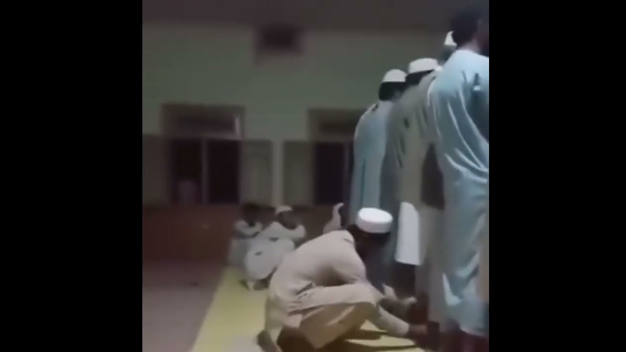 Capturing Tender Moments: A Son's Gesture During Father's Prayer! 