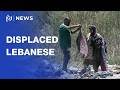 Displaced Lebanese salvage belongings from rubble in devastated southern villages