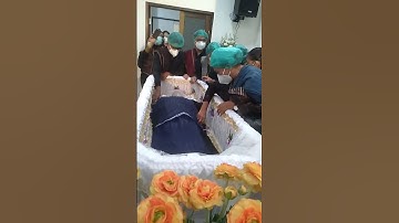 Tulang Simanjuntak pasahot ulos saput ( ulos parsirangan )