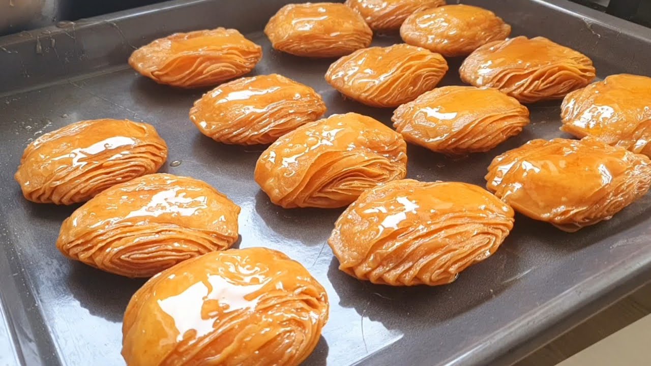 مذاق لايقاوم 😘رغايف العيد كيبقاو مدة طويل مقرمشين حتى من الداخل ولي شافهوم ضروري يطلب المقادير