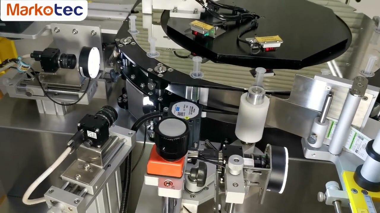 Standard Vertical Star Wheel Wrap Around Labeler - syringe｜Markotec 