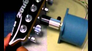 Motorized guitar tuner