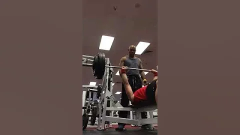 Steve Poythress at gym with Aubrey Surgers benchin...