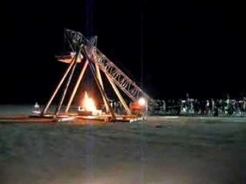 Flaming Piano tossed by Trebuchet