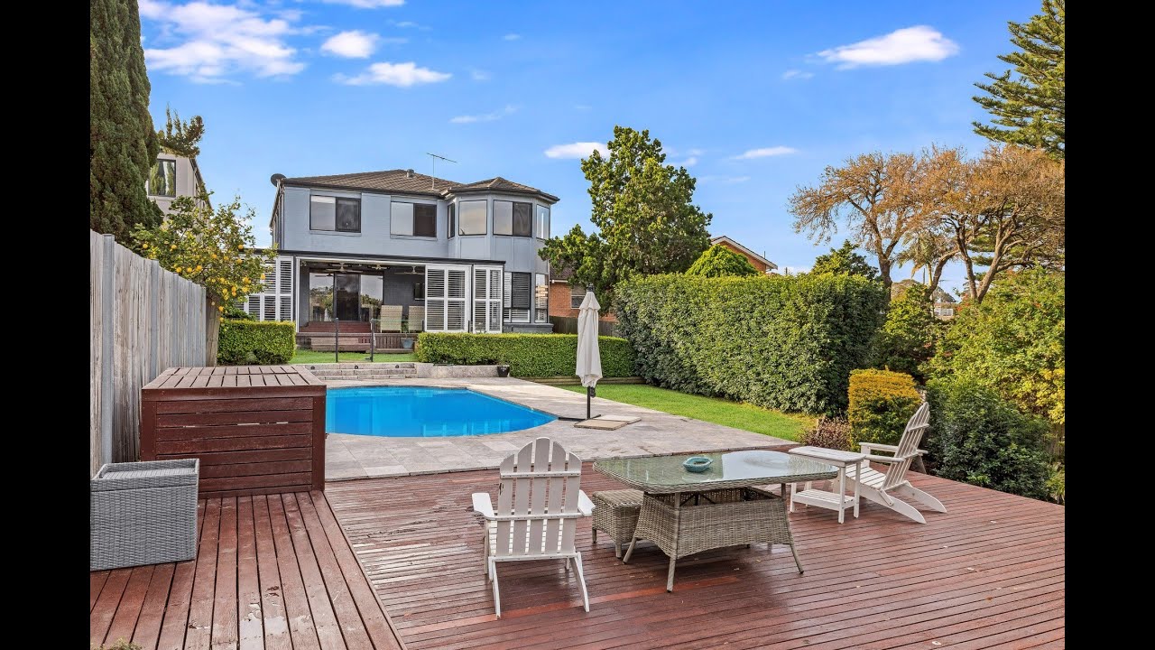 Expansive family home offers yearround entertaining and water views