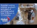 Russian election: CCTV appears to show polling station workers stuffing ballot box