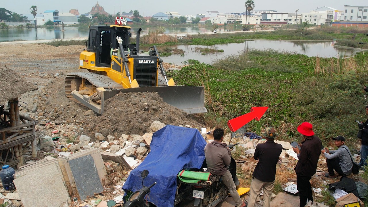 Activities project Use SHANTUI Dozer & Many Dump Truck Unloading Stone Fill Big