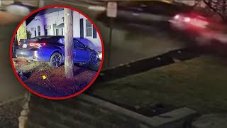 Driver hospitalized after car crashes into yard, boulder