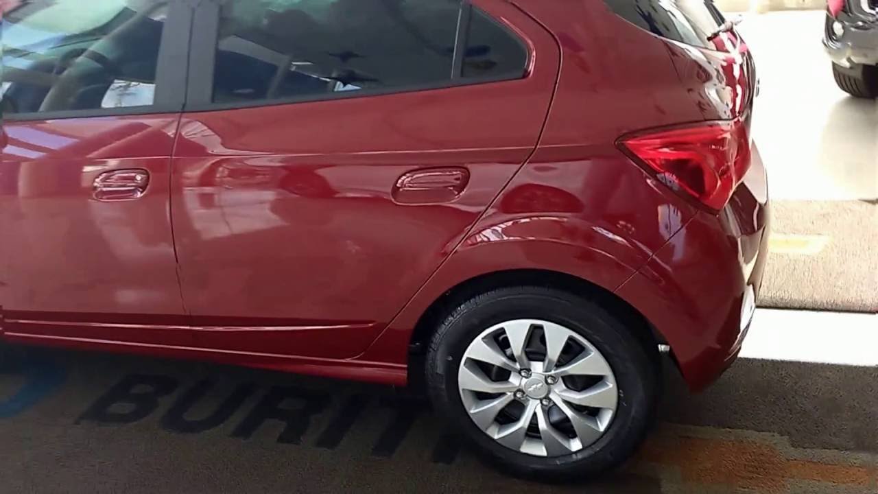 Detalhes novo Onix 2017 LT 1.4 vermelho carmim - YouTube