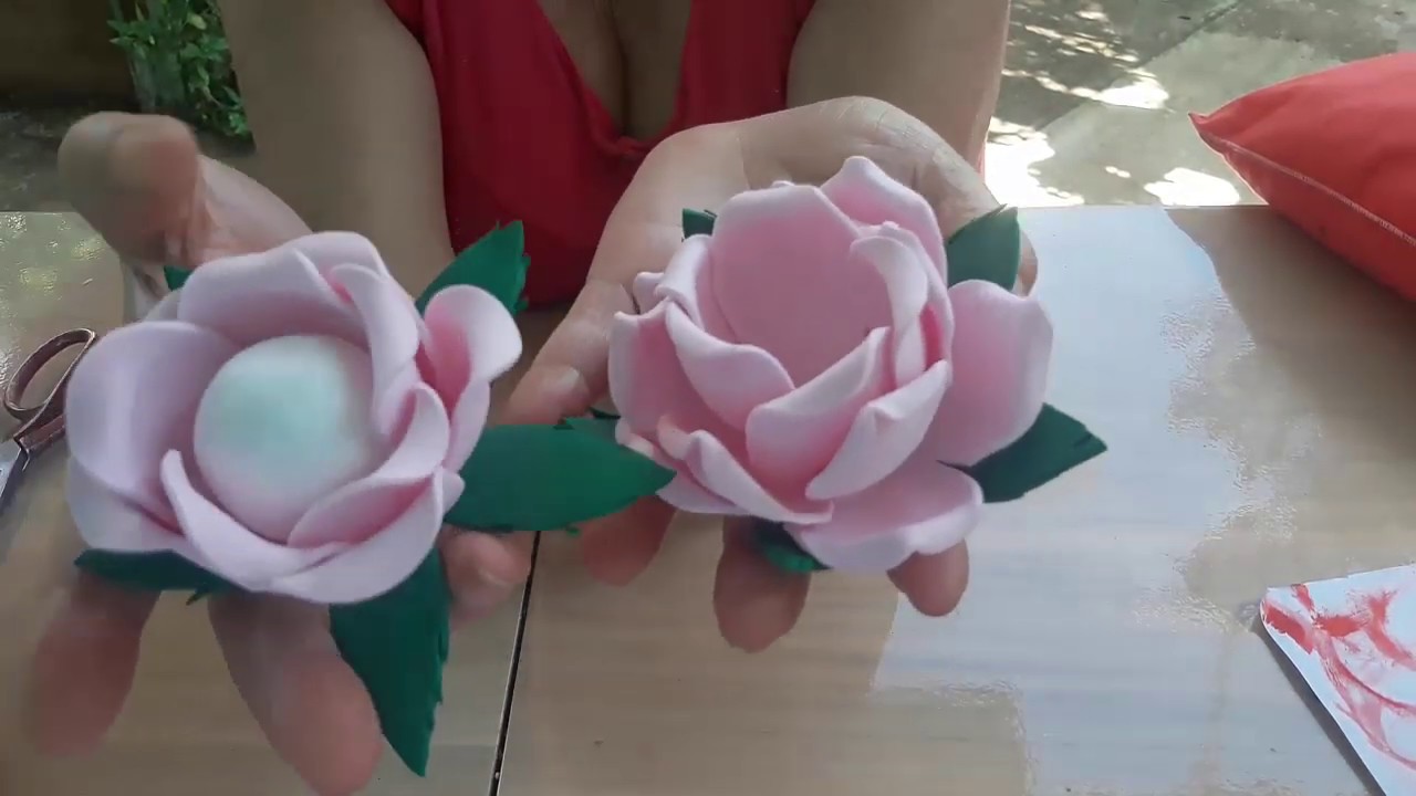 ROSA DE E.V.A. PORTA   DOCINHO. SEM FRISADOR