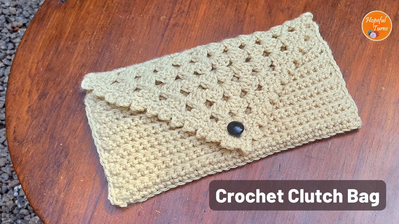 A crossbody envelope purse I made with my first Granny Square : r/crochet