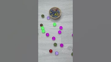 Oddly Satisfying Reverse video with Marbles and Gems.