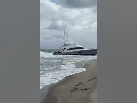 viking yacht beached in delray beach florida