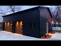 Black exterior modern 30x40 pole barnshop build is finished