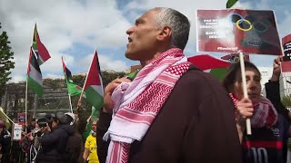 Hundreds gather outside French Olympic HQ to demand ban of Israel