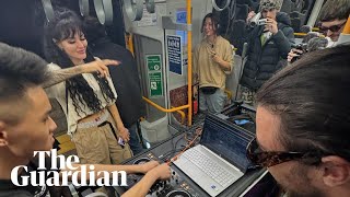 Rave breaks out on Brisbane train as DJs play sets on Shorncliffe line