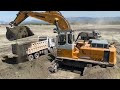 Liebherr 974 excavator loading trucks  sotiriadislabrianidis construction works