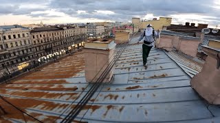 Rooftop walkers : colored graffiti on the main street